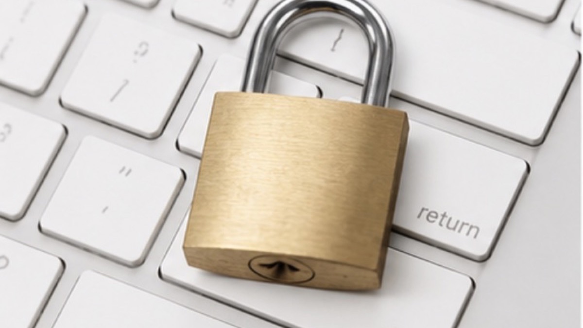 Padlock resting on a computer keyboard